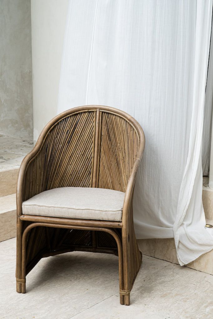 Handcrafted brown rattan Doris chair from Tegal collection, perfect for modern patio or living space