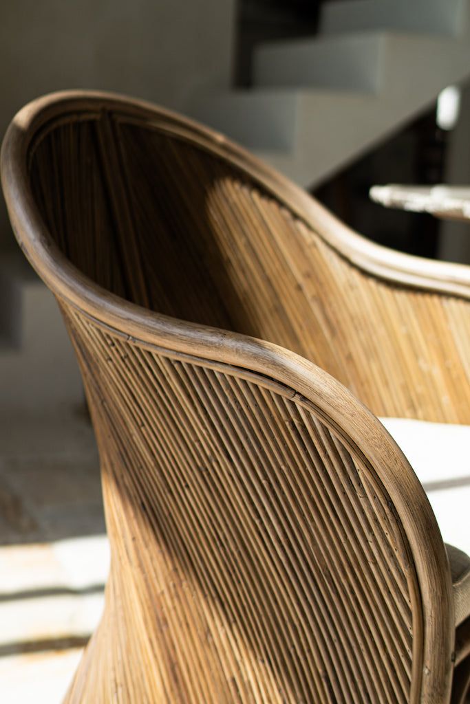 Handcrafted brown rattan Doris chair from Tegal collection, perfect for modern patio or living space