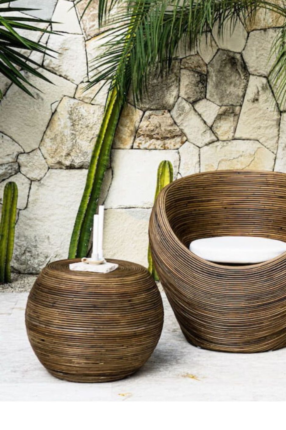Multifunctional brown round rattan table for use as a coffee table, side table, or decorative piece