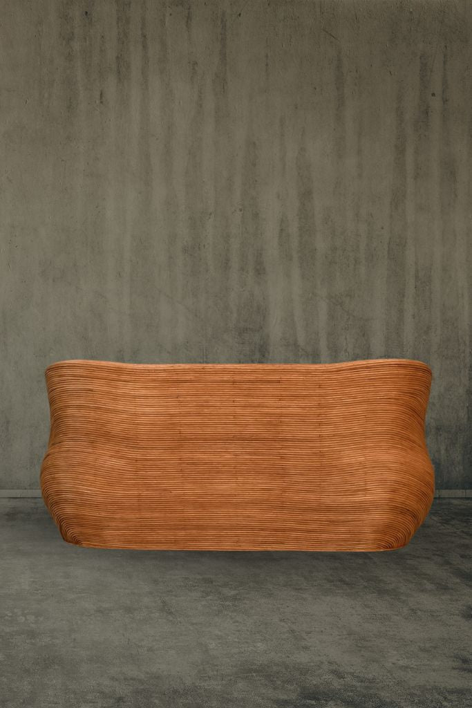 Handmade cognac round rattan sofa Tegal with ecru cushions, designed for eco-friendly outdoor living on patios and terraces