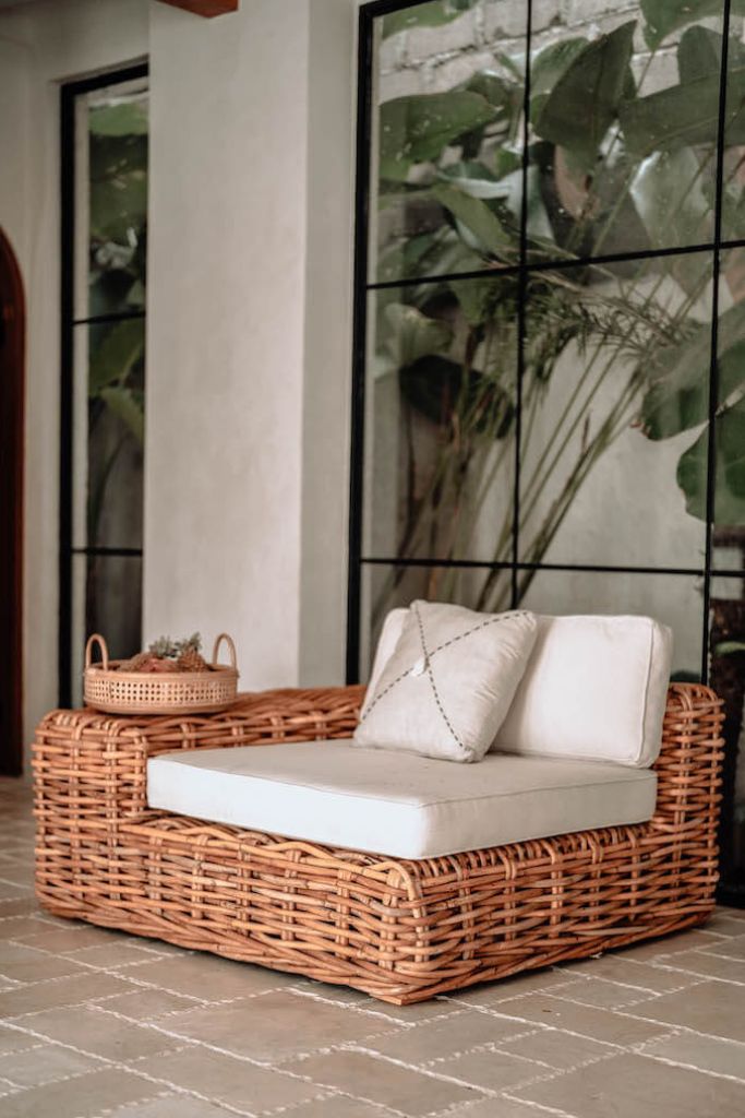 Handmade Ingka modular armchair in cognac rattan with thick weave, versatile as standalone chair or part of modular sofa for living room, terrace, or patio.