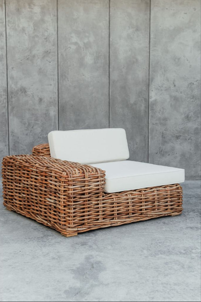 Handmade Ingka modular armchair in cognac rattan with thick weave, versatile as standalone chair or part of modular sofa for living room, terrace, or patio.