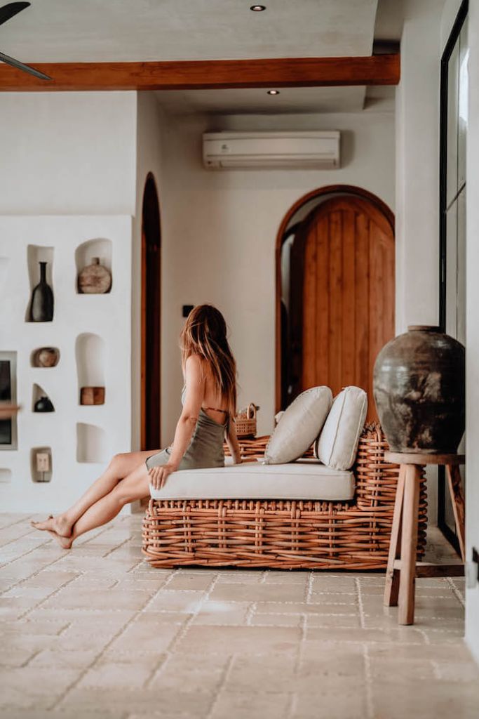 Handmade Ingka modular armchair in cognac rattan with thick weave, versatile as standalone chair or part of modular sofa for living room, terrace, or patio.