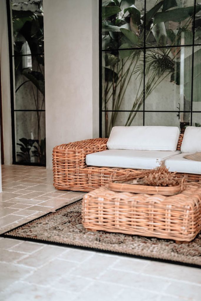 Handmade Ingka modular armchair in cognac rattan with thick weave, versatile as standalone chair or part of modular sofa for living room, terrace, or patio.