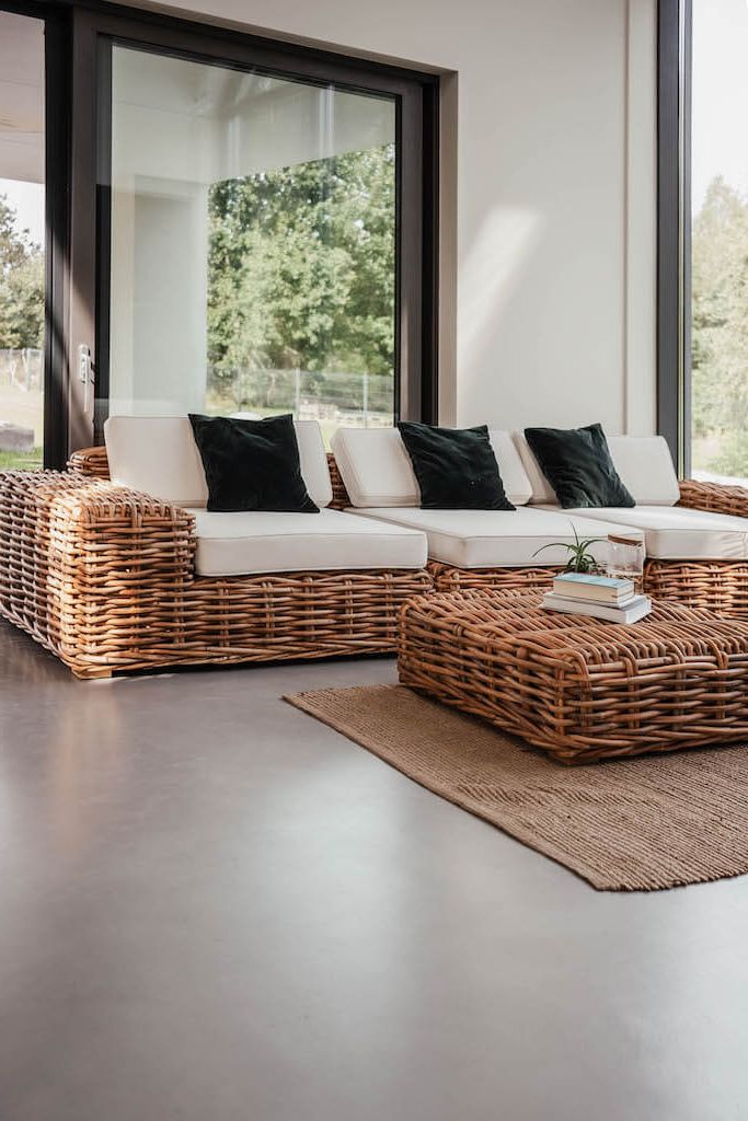 Handmade Ingka modular armchair in cognac rattan with thick weave, versatile as standalone chair or part of modular sofa for living room, terrace, or patio.