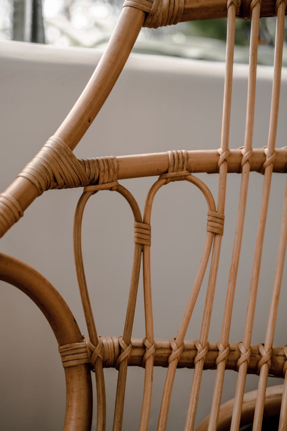 Handmade Milo Rattan Chair with wooden legs in natural colour, boho style seating for living room, bedroom, patio, or garden