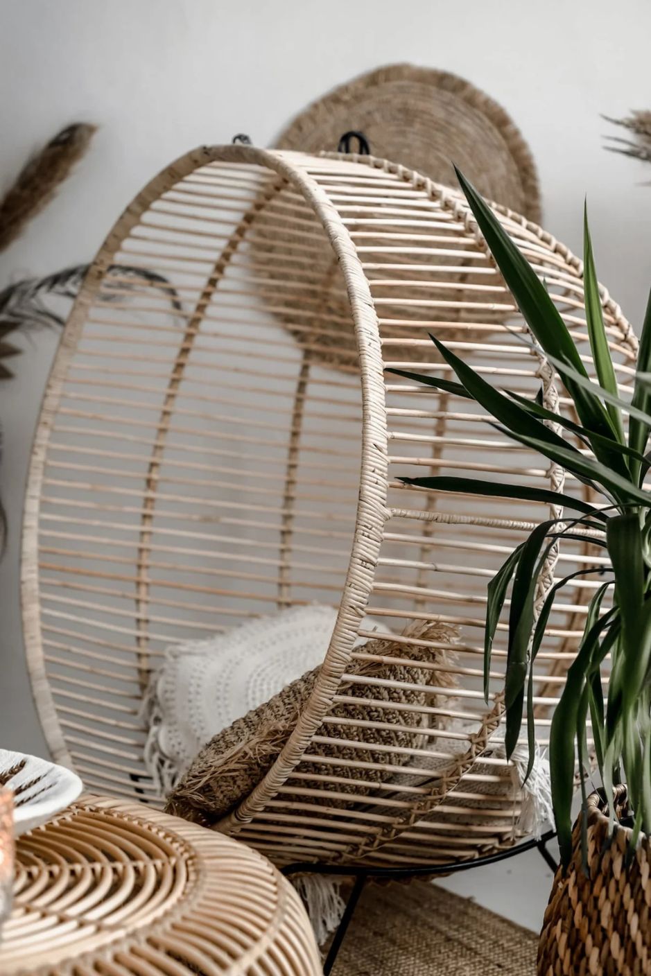 Hanging and standing rattan ball swing chair for adults and kids, available in single adult and junior sizes, handmade natural rattan, includes metal stand and rope, perfect for patio, garden, deck, or poolside, stylish boho, modern, and classic interior accessory.