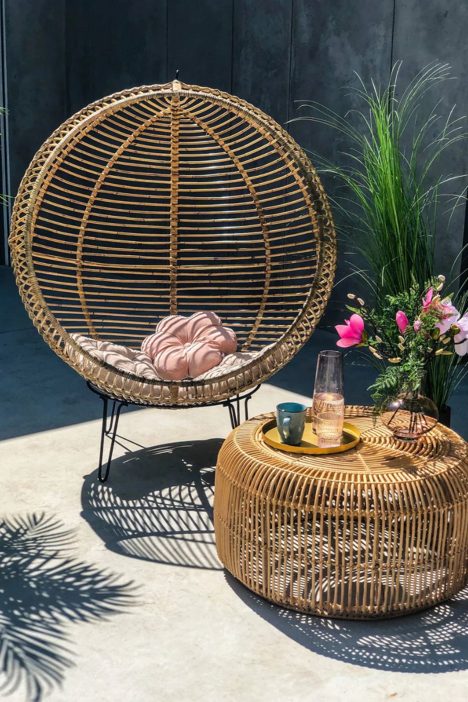 Hanging and standing rattan ball swing chair for adults and kids, available in single adult and junior sizes, handmade natural rattan, includes metal stand and rope, perfect for patio, garden, deck, or poolside, stylish boho, modern, and classic interior accessory.