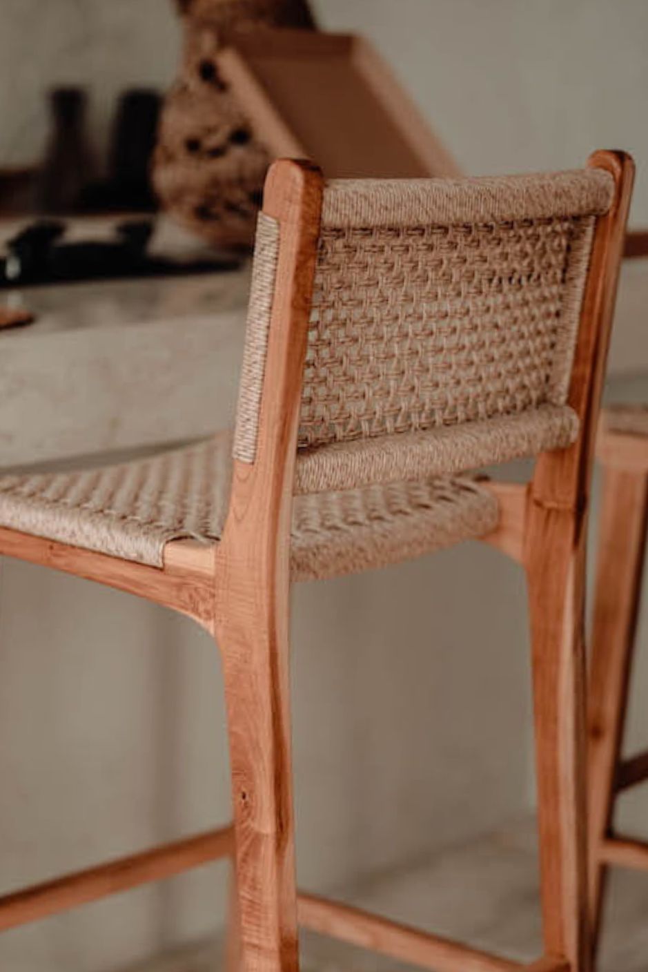 Handmade Harrison teak bar stool with woven synthetic seat and backrest, stylish and durable high chair for kitchen counters or bar tables, perfect for modern Australian interiors.