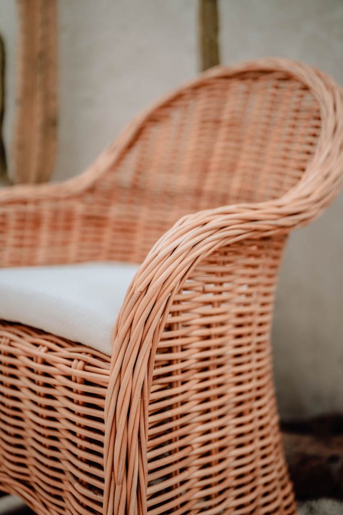 Handmade Ingka Alo cognac rattan chair with thick weave, natural tones, perfect for modern living spaces