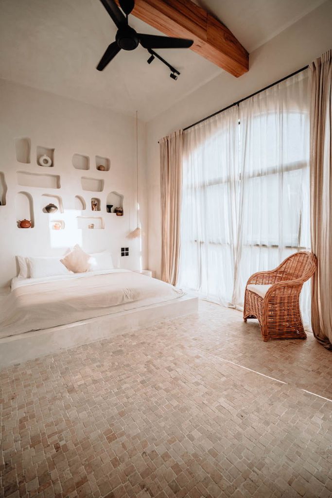 Handmade Ingka Alo cognac rattan chair with thick weave, natural tones, perfect for modern living spaces