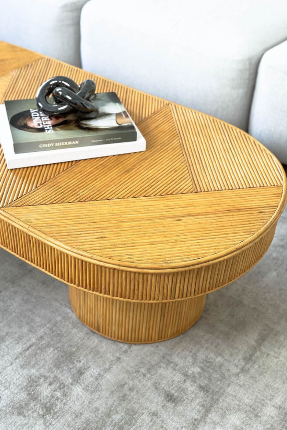 Handmade Tegal Isla natural oval rattan coffee table, eco-friendly, boho style, perfect for living rooms, TV rooms, and modern or coastal interiors.