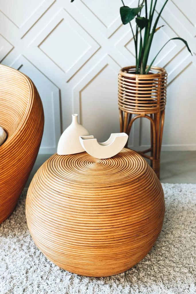 Multifunctional natural round rattan table for use as a coffee table, side table, or decorative piece