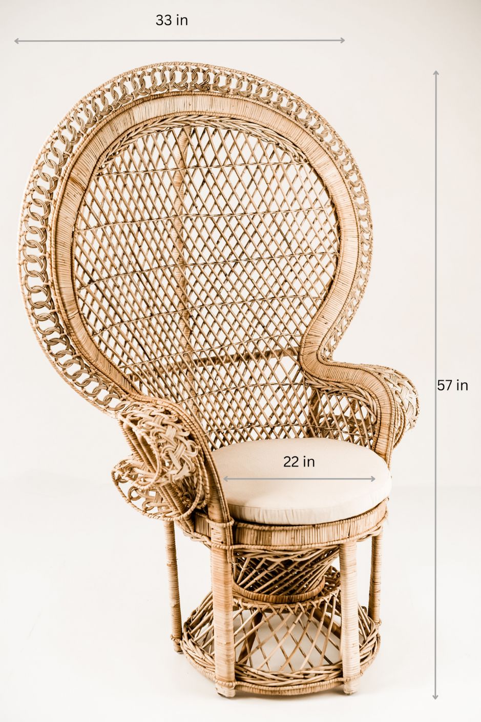 Peacock rattan chair with high back and cream cushion, handcrafted from natural rattan, perfect oversized boho accent for indoor or covered outdoor spaces