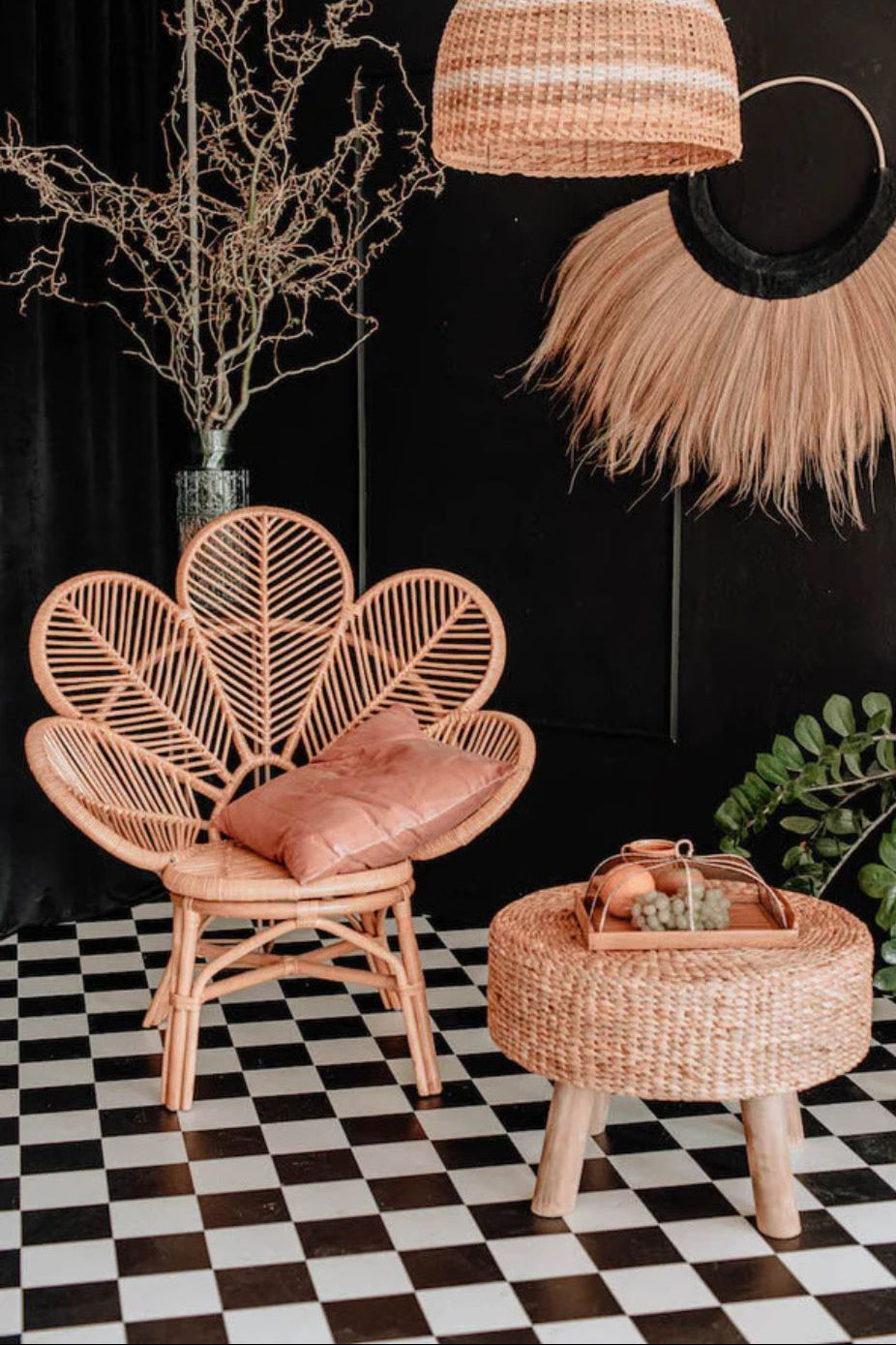 Rattan Monna Flower Chair featuring a handcrafted petal-shaped backrest and natural rattan weave, offering elegant bohemian style for indoor or outdoor spaces