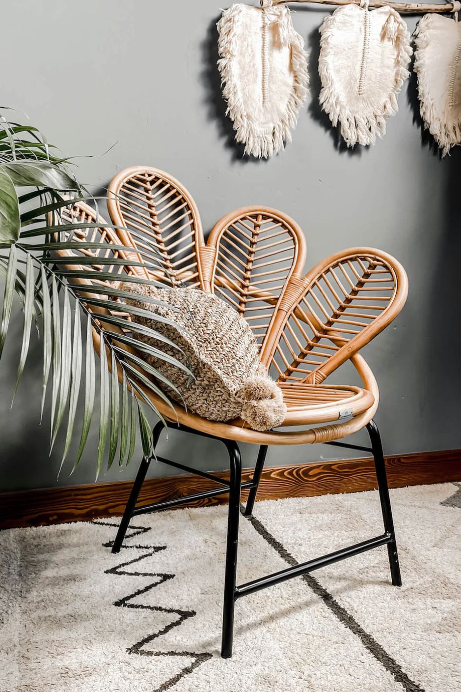 Rattan Sia Flower Chair in natural finish - handcrafted bohemian furniture with a petal-shaped backrest and woven rattan design, ideal for living rooms, bedrooms, or outdoor spaces