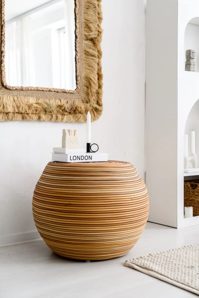 Multifunctional synthetic round rattan table for use as a coffee table, side table, or decorative piece