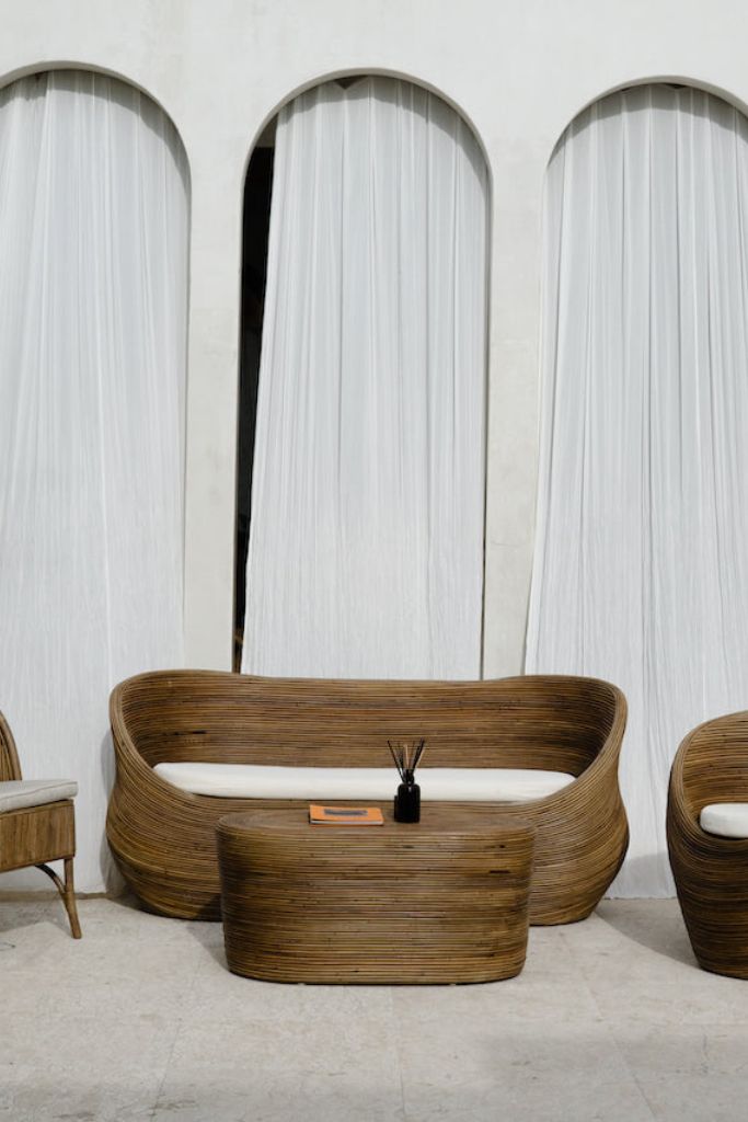 Tegal Oval Rattan Table in rich brown finish, handwoven from durable natural rattan for indoor or outdoor use