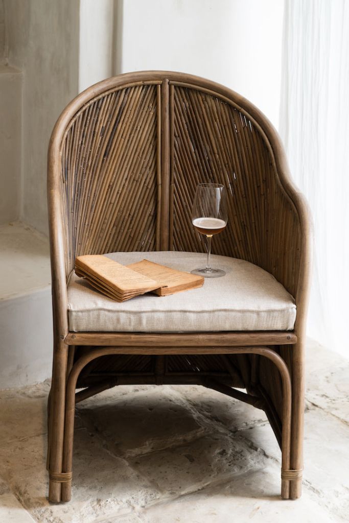 Handcrafted brown rattan Doris chair from Tegal collection, perfect for modern patio or living space