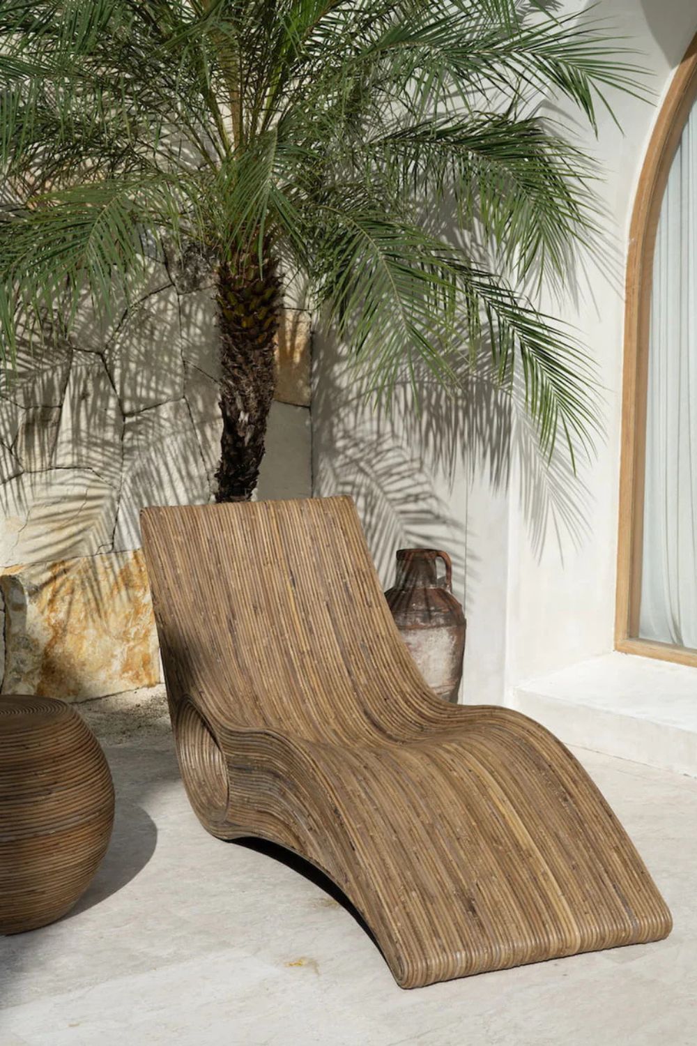 Eco-friendly brown rattan sun lounger - Tegal Camila Orianson sustainable handmade outdoor furniture for poolside and garden