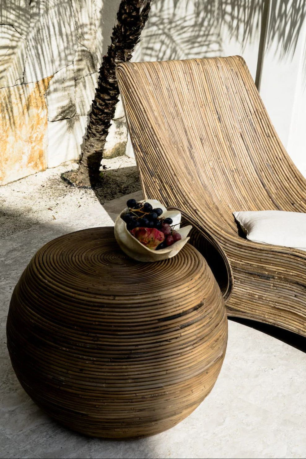 Eco-friendly brown rattan sun lounger - Tegal Camila Orianson sustainable handmade outdoor furniture for poolside and garden