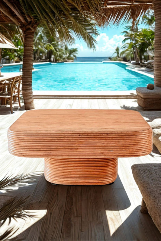 Coastal style natural rattan table Tegal Carla Square with straight pedestal, handmade artisan furniture for living room, swimming pool or lounge spaces.