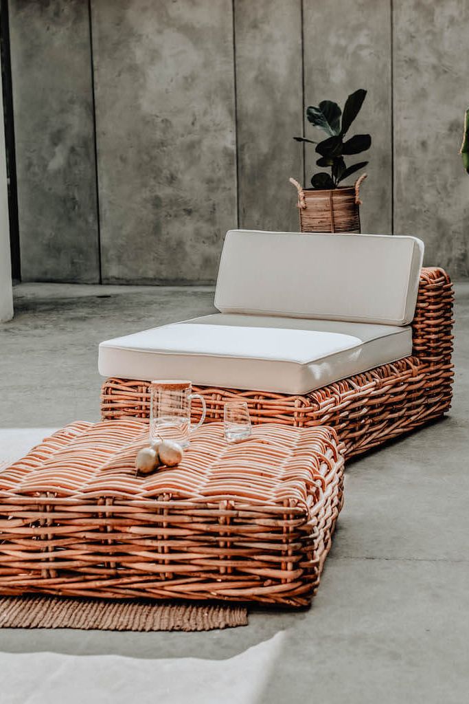 Handmade Ingka modular armchair in cognac rattan with thick weave, versatile as standalone chair or part of modular sofa for living room, terrace, or patio.