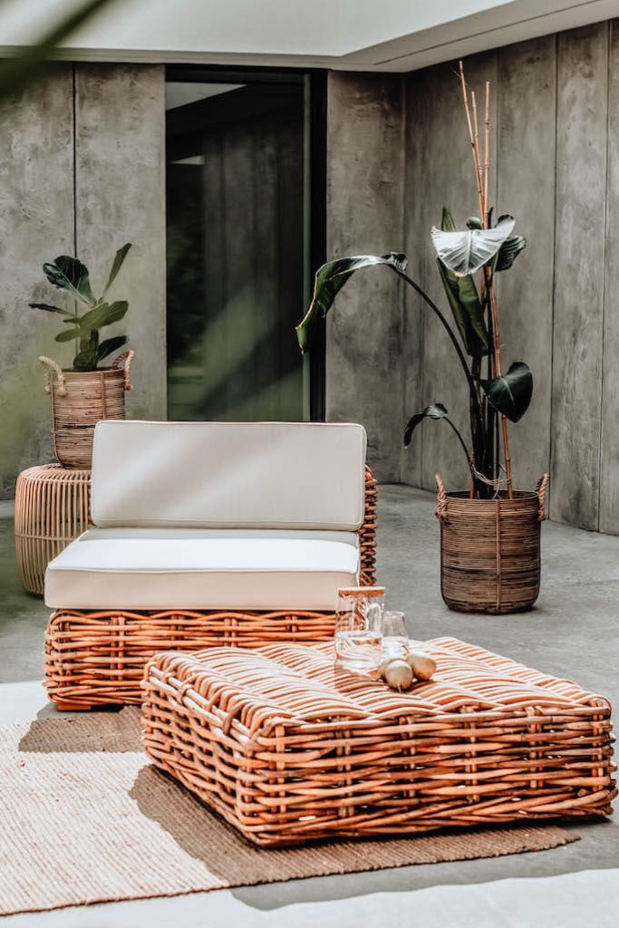 Handmade Ingka modular armchair in cognac rattan with thick weave, versatile as standalone chair or part of modular sofa for living room, terrace, or patio.