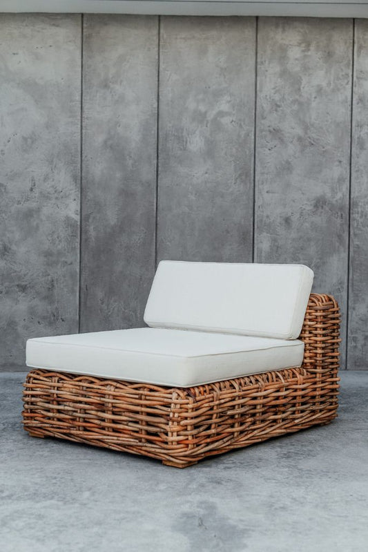 Handmade Ingka modular armchair in cognac rattan with thick weave, versatile as standalone chair or part of modular sofa for living room, terrace, or patio.