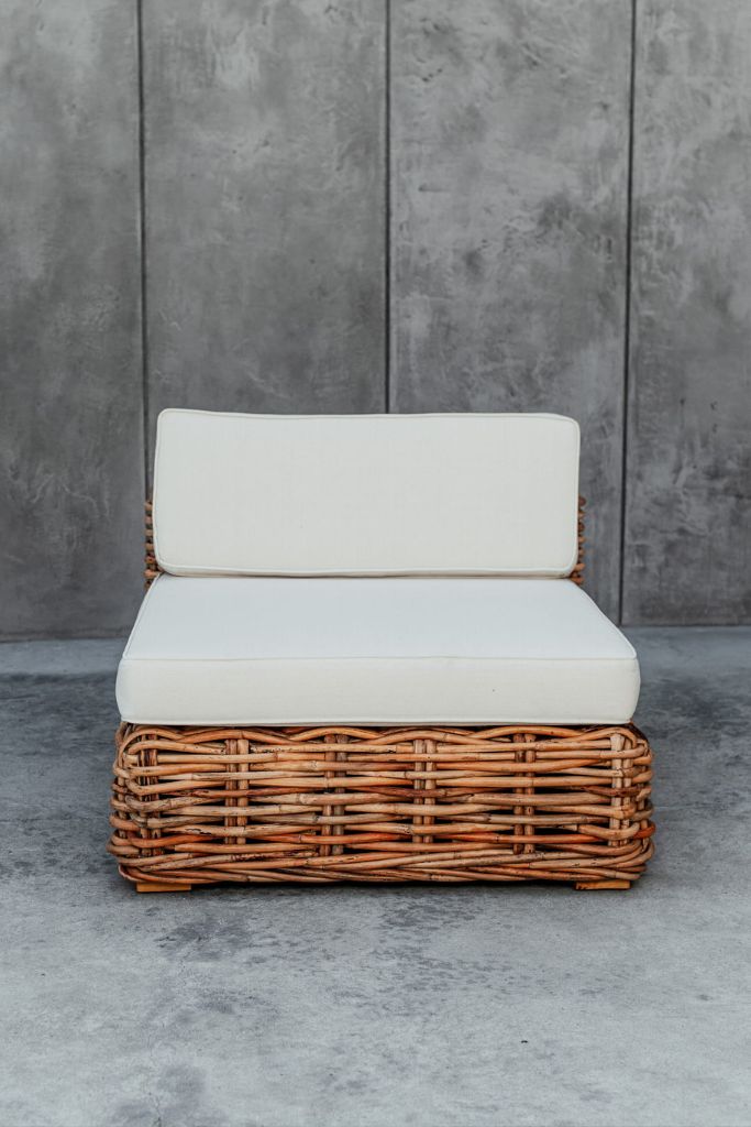 Handmade Ingka modular armchair in cognac rattan with thick weave, versatile as standalone chair or part of modular sofa for living room, terrace, or patio.