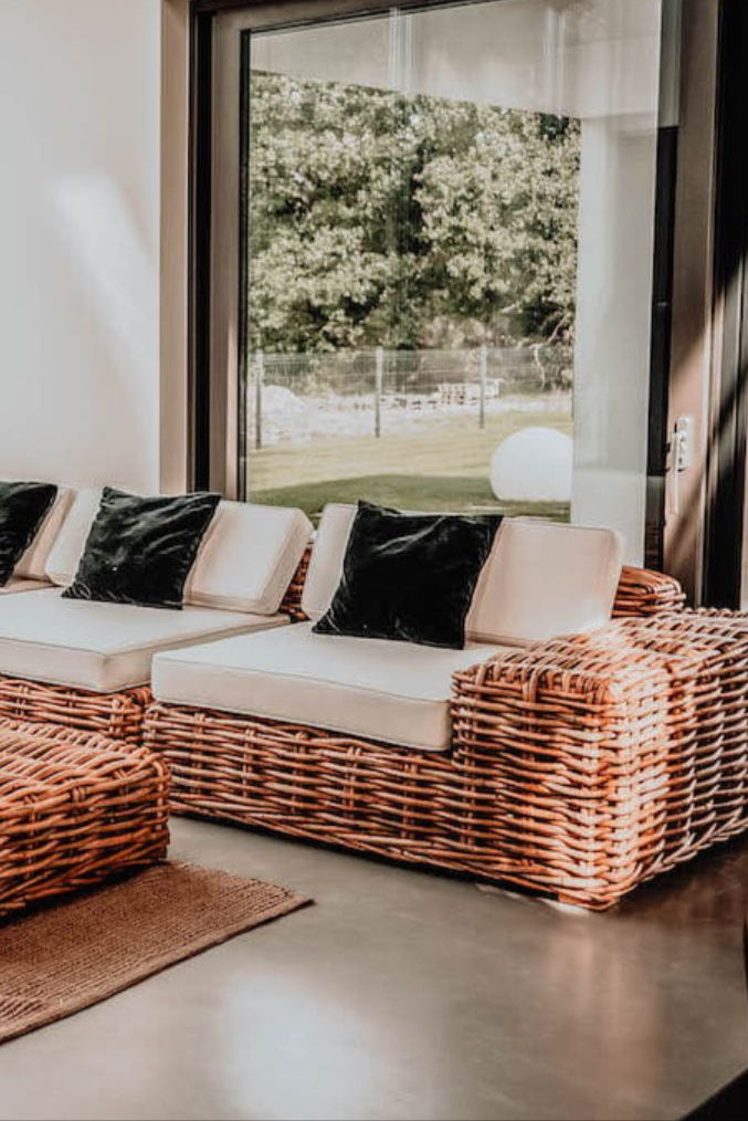 Handmade Ingka modular armchair in cognac rattan with thick weave, versatile as standalone chair or part of modular sofa for living room, terrace, or patio.