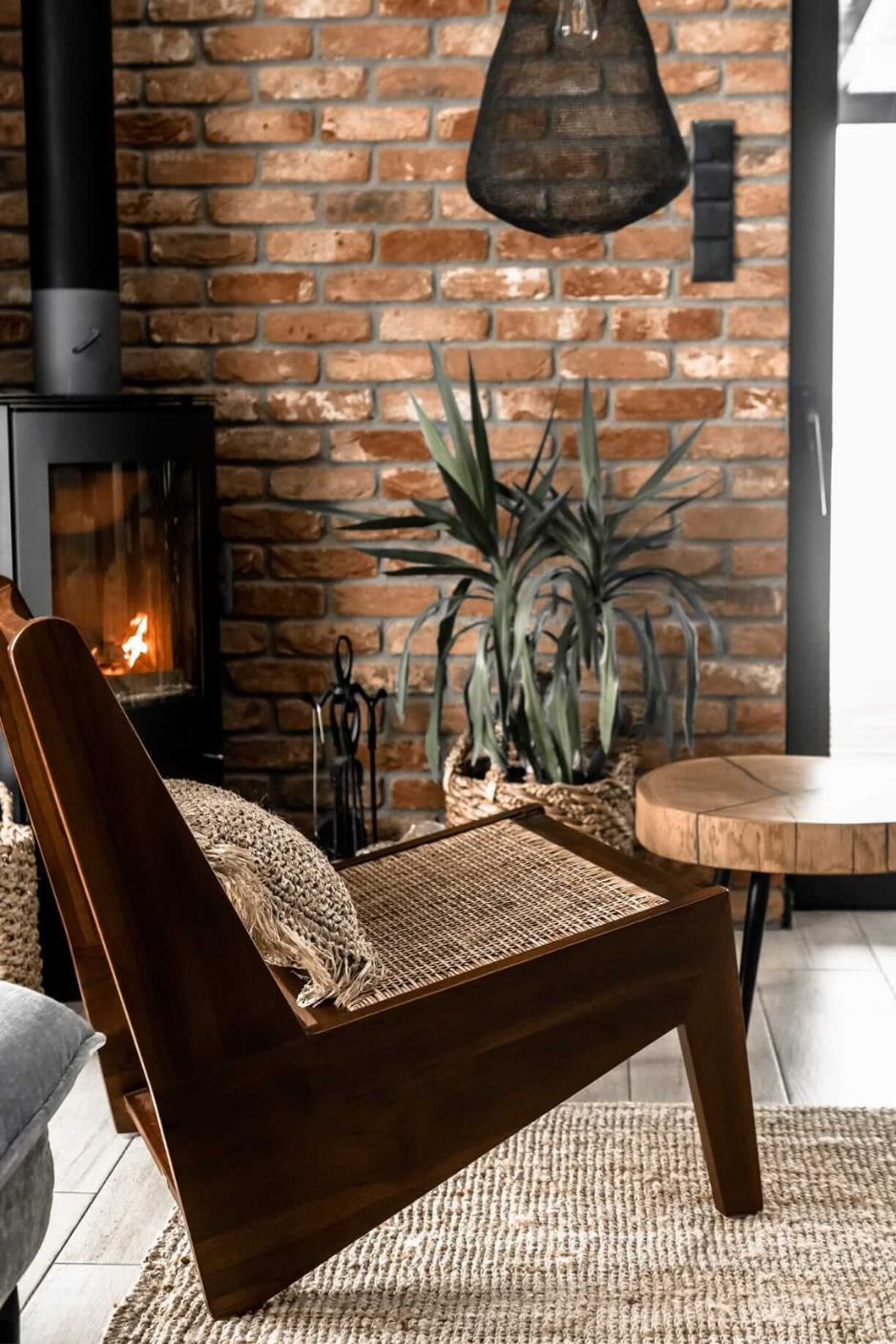 Elisha teak wood chair with handcrafted rattan seat and back, stylish and durable for indoor or outdoor use, perfect for dining rooms, patios, and living spaces.