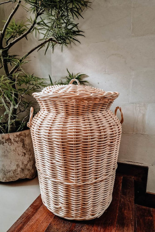Handwoven Loomi Basket made from natural rattan, eco-friendly storage solution for bedrooms, bathrooms, living rooms, and laundry rooms, lightweight and durable, rustic and stylish home organisation accessory.