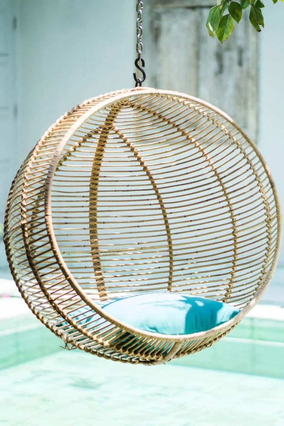 Hanging and standing rattan ball swing chair for adults and kids, available in single adult and junior sizes, handmade natural rattan, includes metal stand and rope, perfect for patio, garden, deck, or poolside, stylish boho, modern, and classic interior accessory.