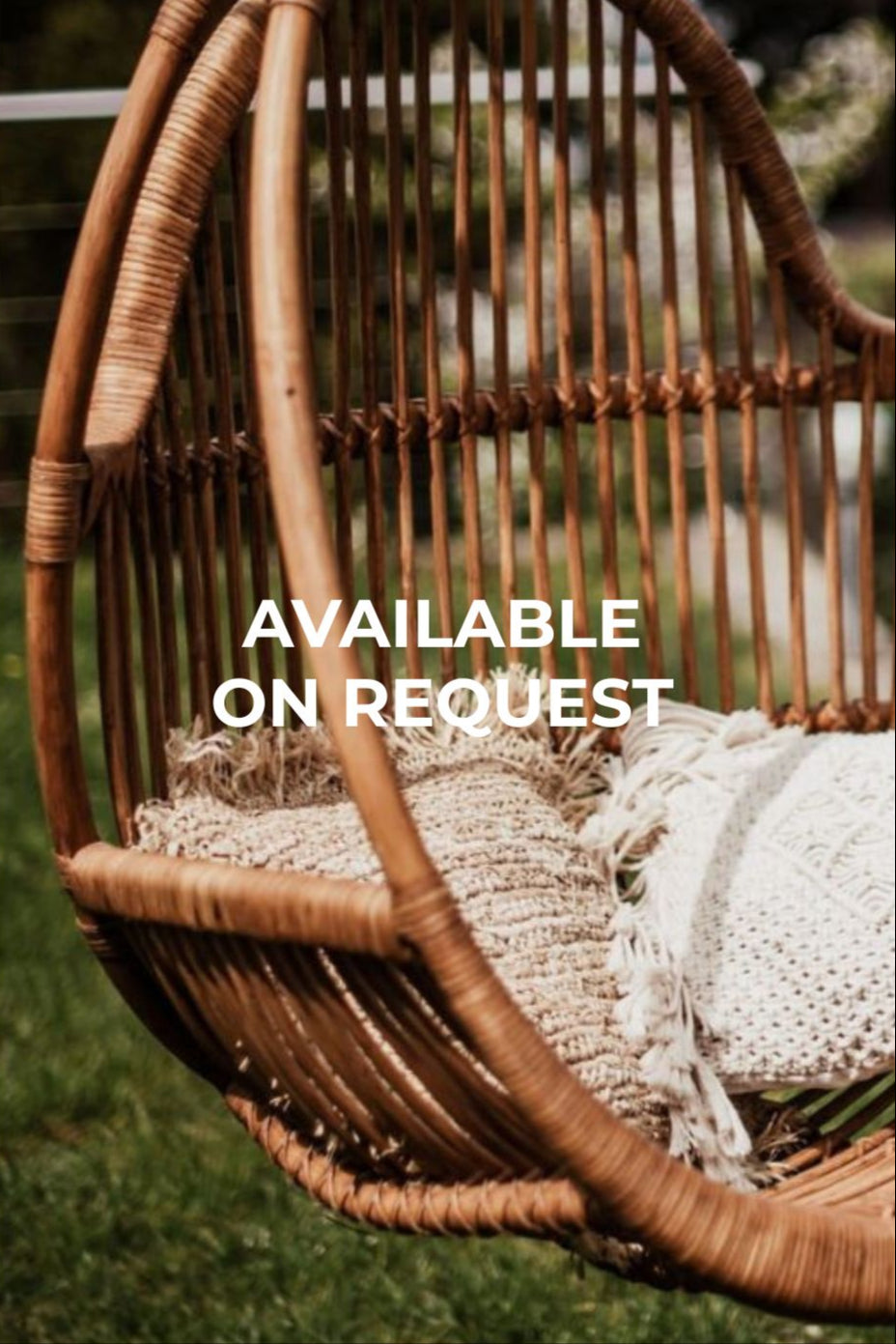 Henry single or double handmade durable cognac rattan hanging chair for indoor living rooms, covered terraces, patios, balconies, and outdoor gardens