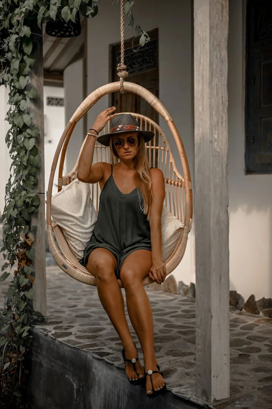 Henry single or double handmade durable ecru rattan hanging chair for indoor living rooms, covered terraces, patios, balconies, and outdoor gardens