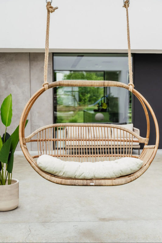 Henry single or double handmade durable light rattan hanging chair for indoor living rooms, covered terraces, patios, balconies, and outdoor gardens