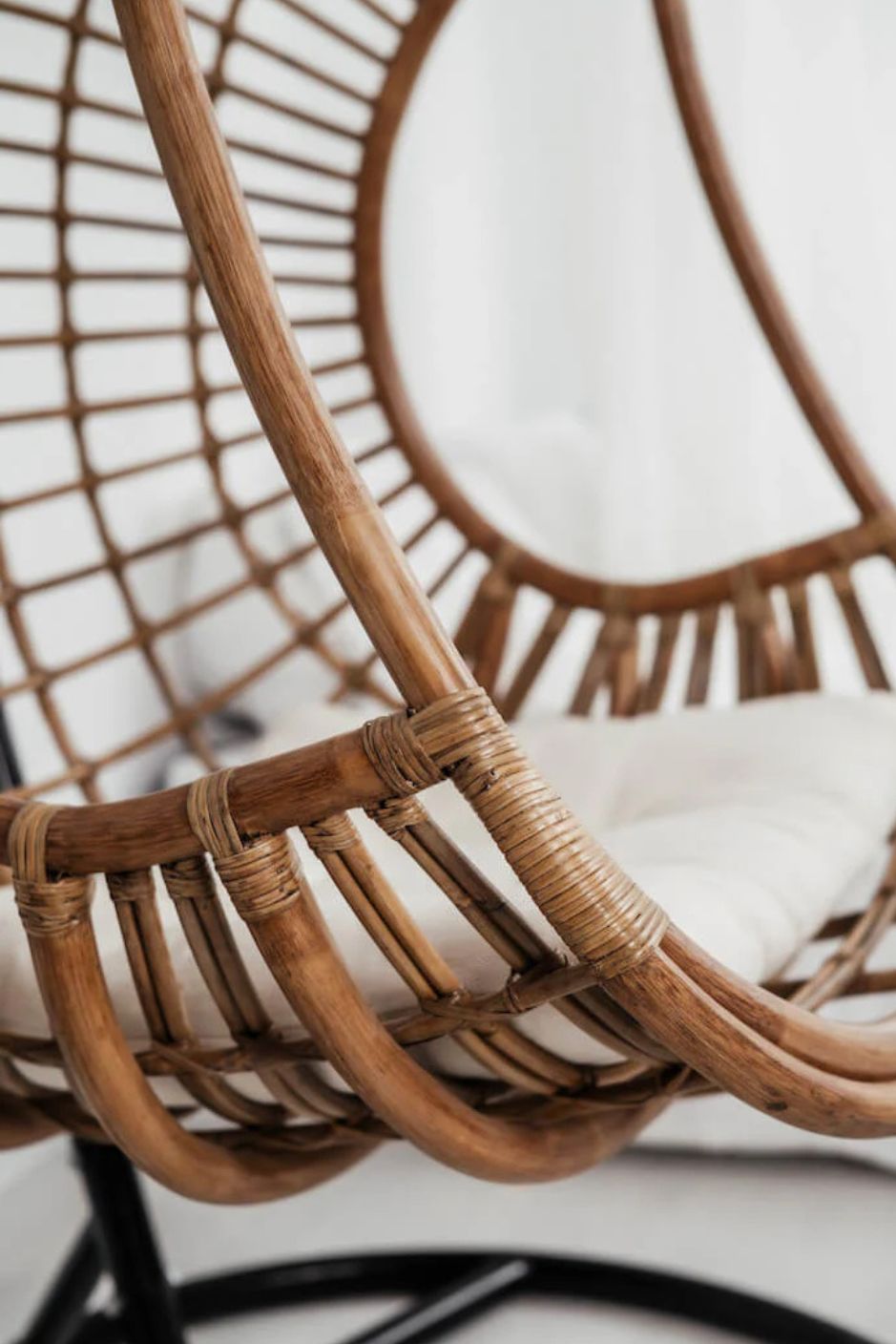 Hugo Rattan Hanging Chair in natural, cognac and brown rattan, handmade, eco-friendly, zero plastic, boho style, perfect for living room, terrace, or patio, stylish and comfortable swinging chair for modern or island-inspired interiors.