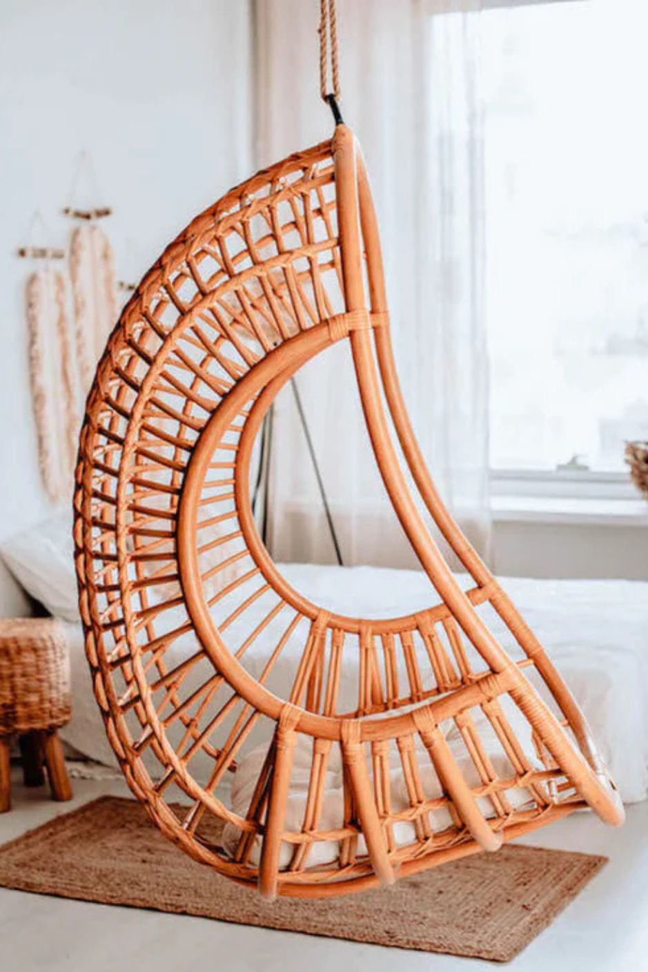Hugo Rattan Hanging Chair in natural, cognac and brown rattan, handmade, eco-friendly, zero plastic, boho style, perfect for living room, terrace, or patio, stylish and comfortable swinging chair for modern or island-inspired interiors.
