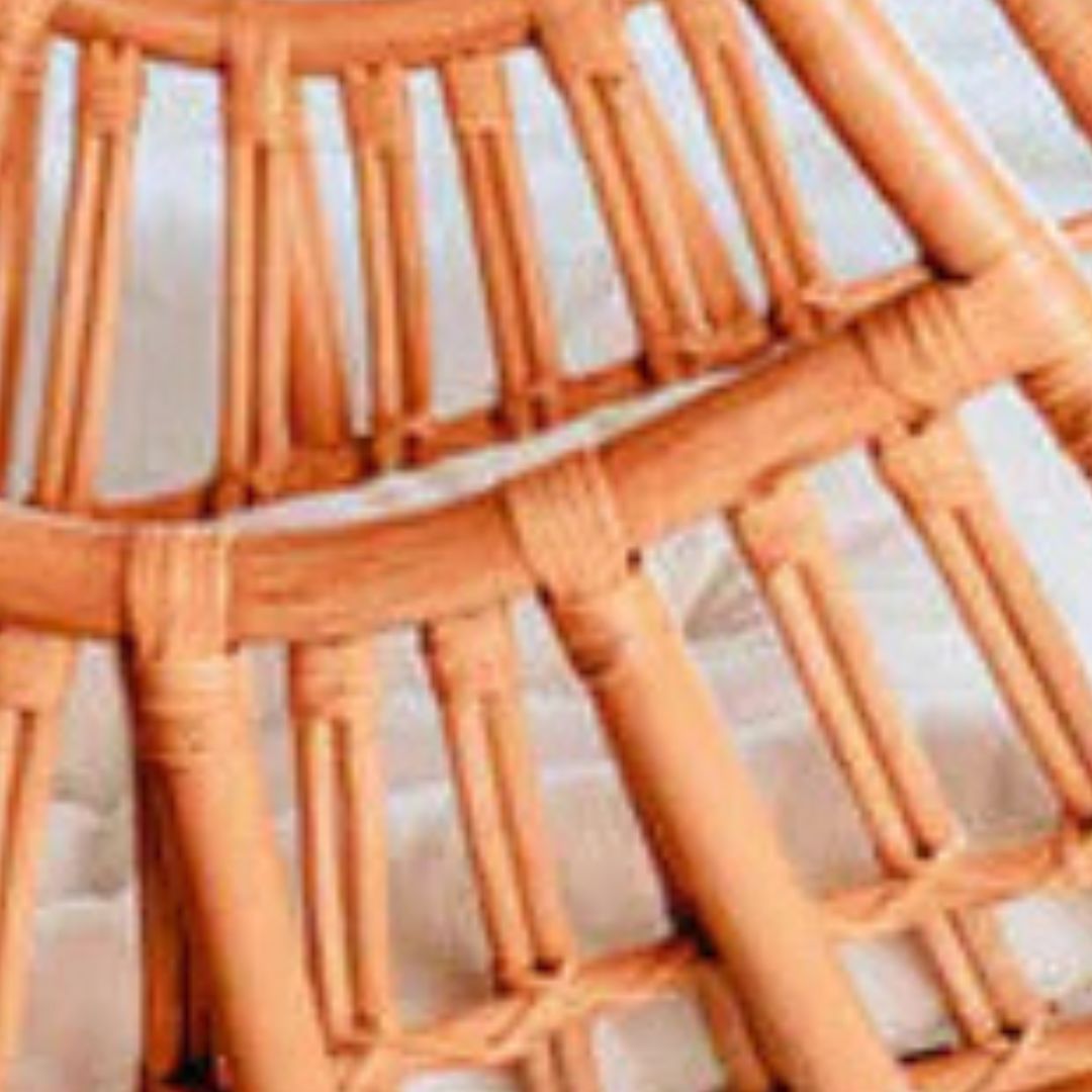 Hugo Rattan Hanging Chair in natural, cognac and brown rattan, handmade, eco-friendly, zero plastic, boho style, perfect for living room, terrace, or patio, stylish and comfortable swinging chair for modern or island-inspired interiors.
