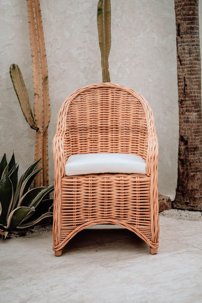 Handmade Ingka Alo cognac rattan chair with thick weave, natural tones, perfect for modern living spaces