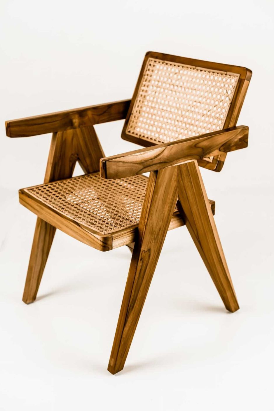 Joy Chair handmade from durable teak wood with woven rattan seat and backrest – stylish eco-friendly dining chair for modern homes.