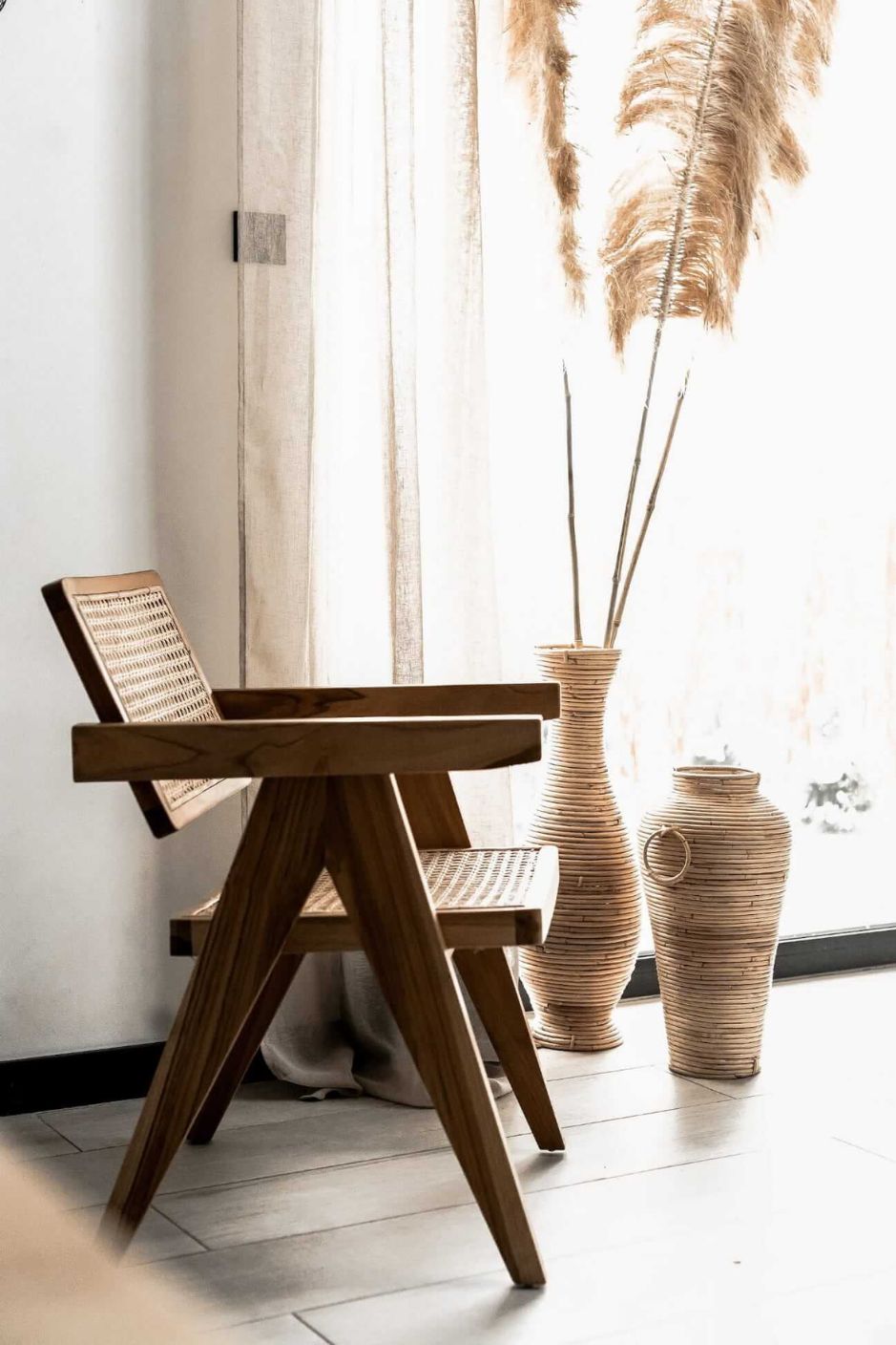Joy Chair handmade from durable teak wood with woven rattan seat and backrest – stylish eco-friendly dining chair for modern homes.