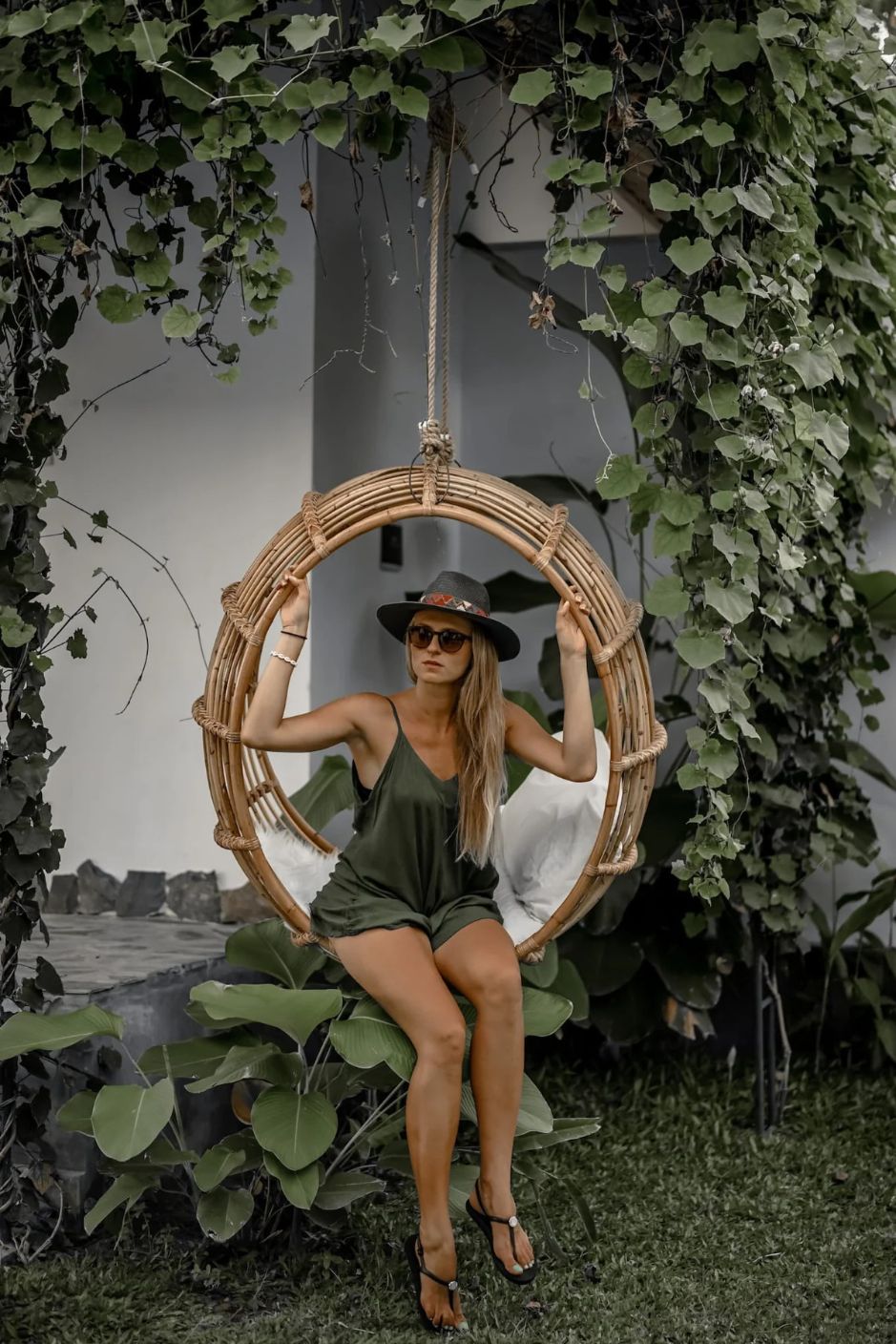Durable handmade natural rattan hanging swing chair single, designed for relaxing indoor or outdoor comfort.