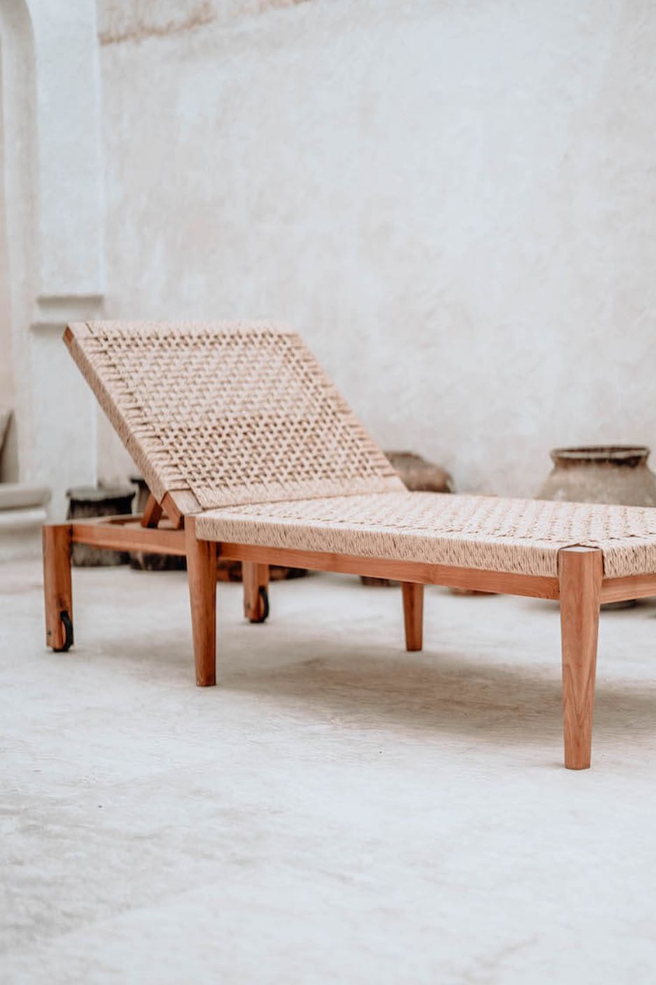 Lunan teak wood sun lounger with adjustable backrest and convenient wheels for outdoor relaxation