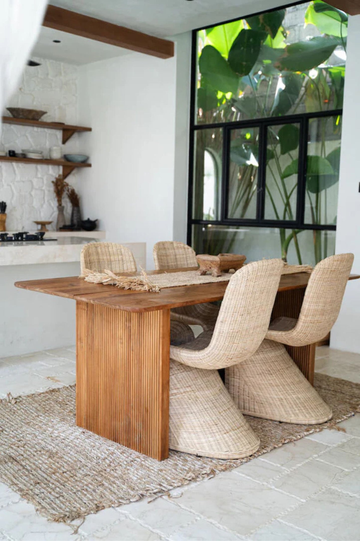 Oriana Collection handmade rattan chair with modern curved design, unique craftsmanship