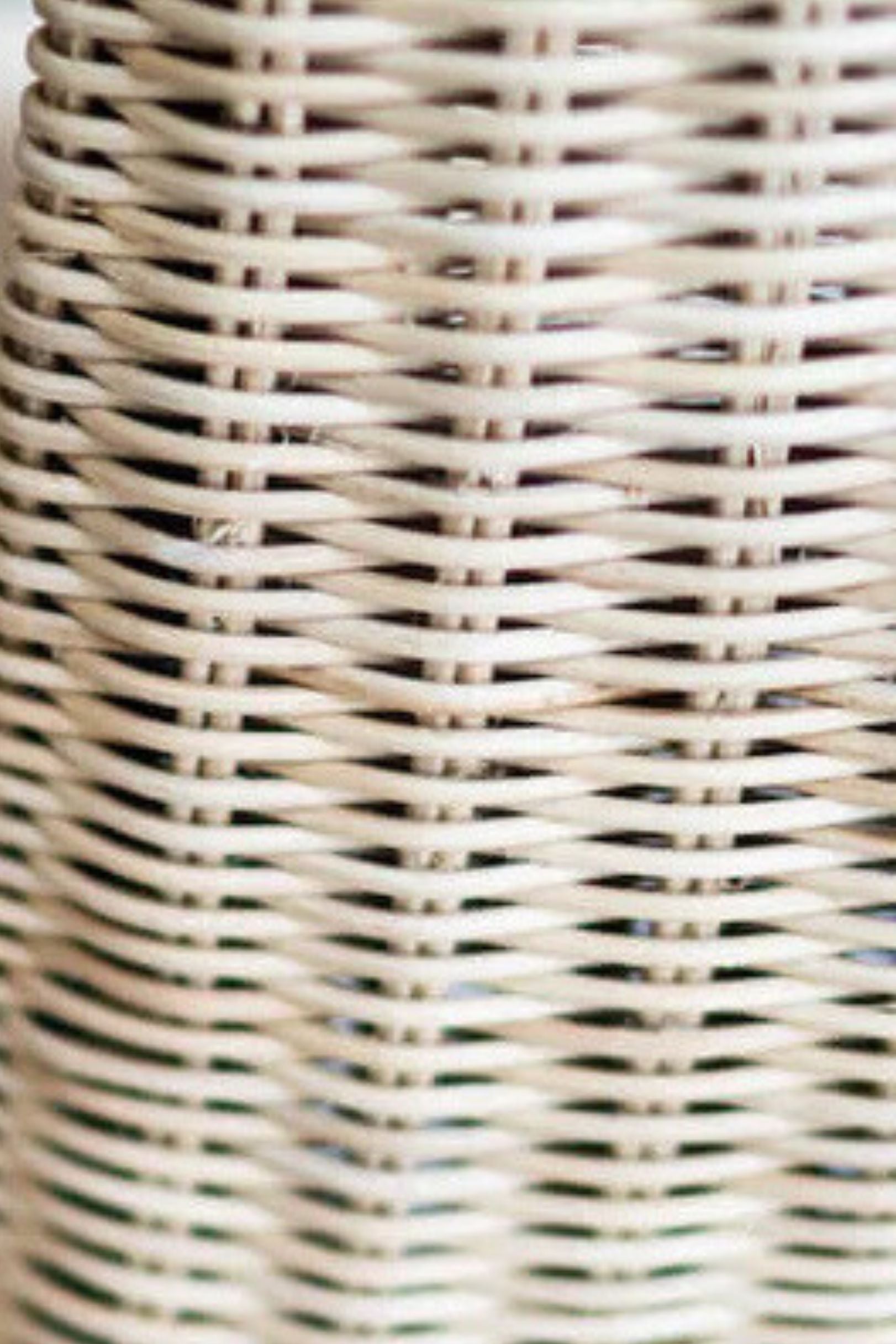 Oriana Collection handmade rattan chair with modern curved design, unique craftsmanship