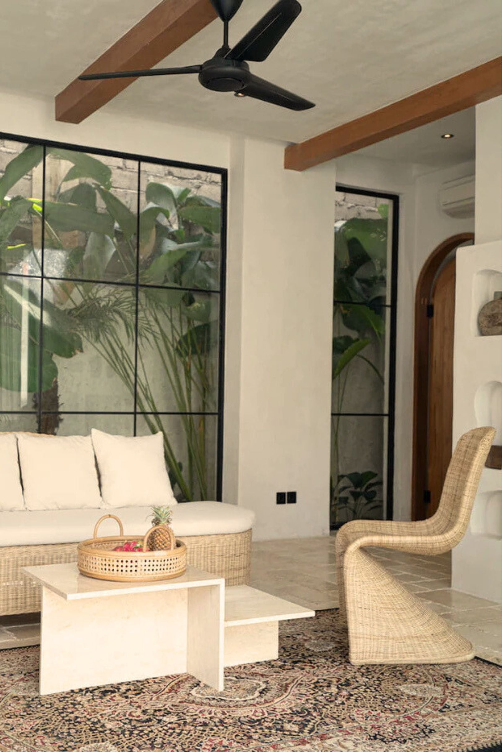 Oriana Collection handmade rattan chair with modern curved design, unique craftsmanship