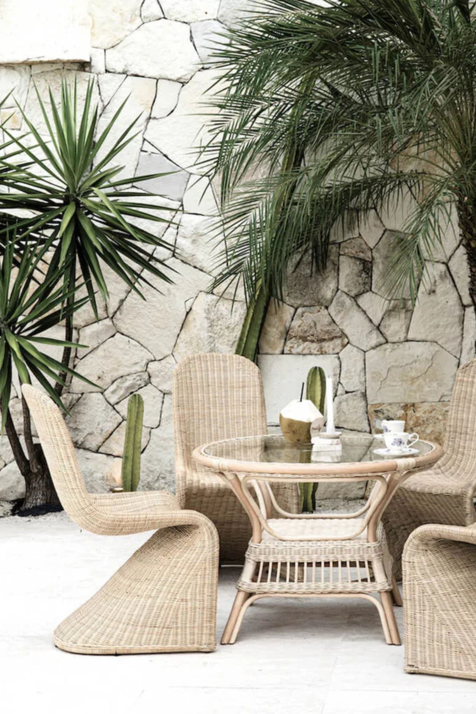 Oriana Collection handmade rattan chair with modern curved design, unique craftsmanship
