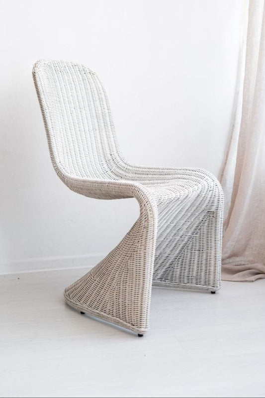 Oriana Collection handmade rattan chair with modern curved design, unique craftsmanship